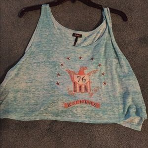 A blue Nollie crop top.